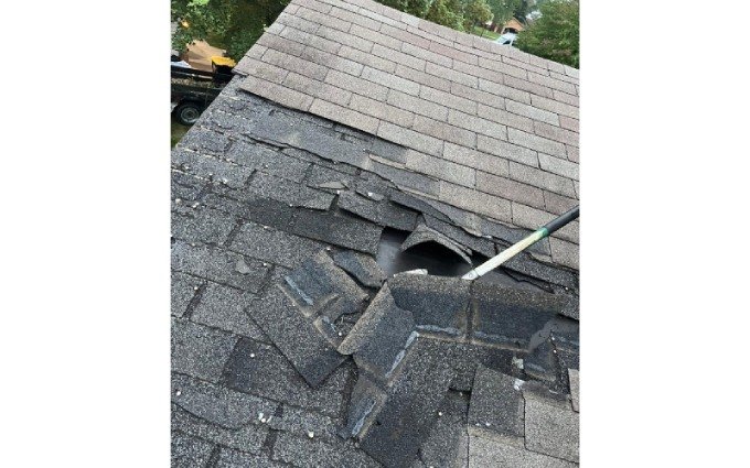 roof storm damage repair in lansing